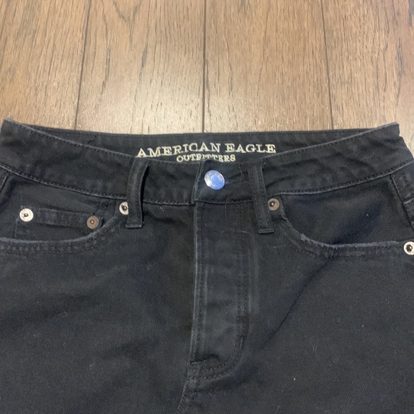 Black denim mini skirt. Button fly - Picture 3 of 5